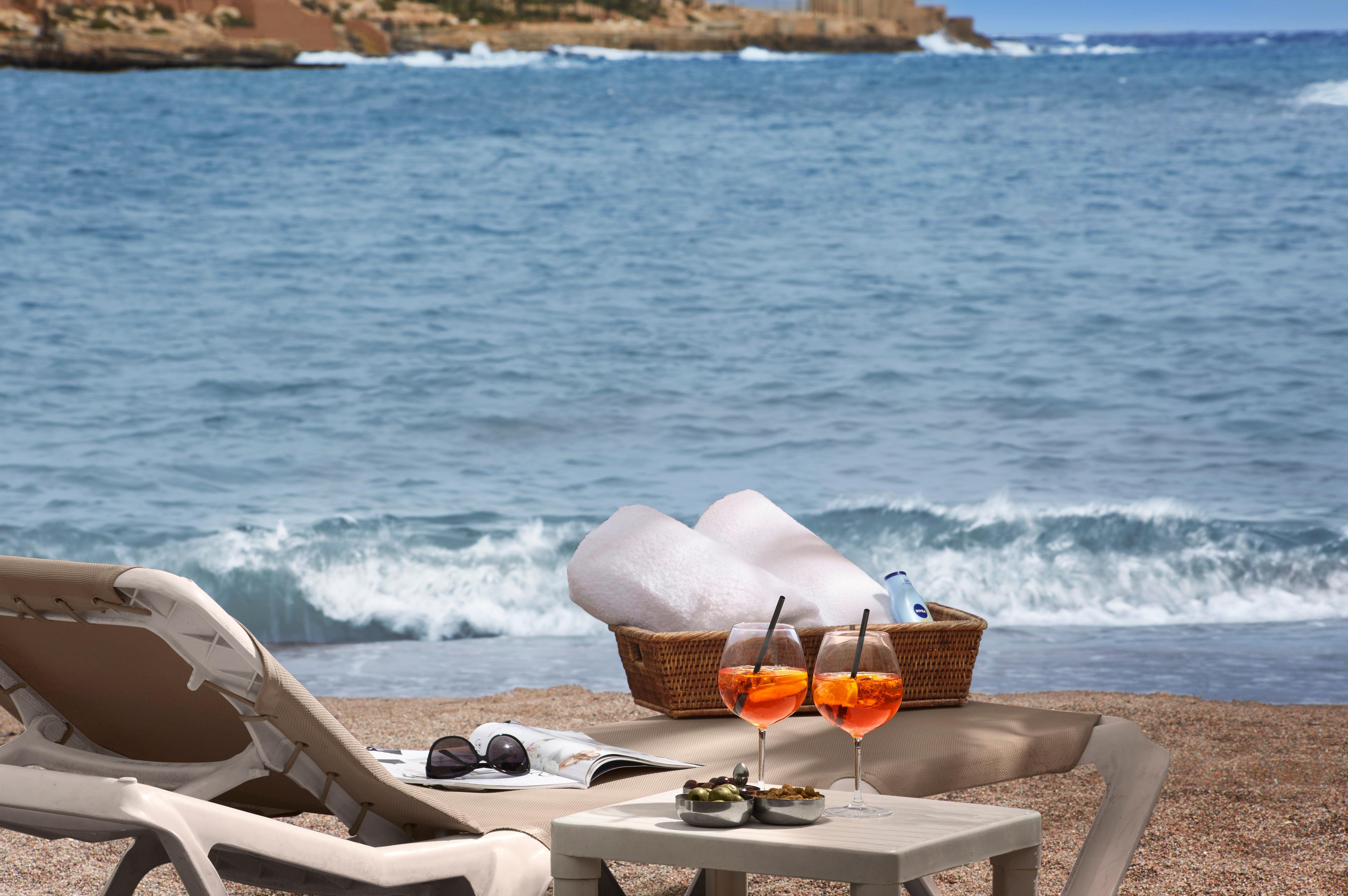 Intercontinental Malta By Ihg Hotel Saint Julian's Exterior photo Beach in Italy
