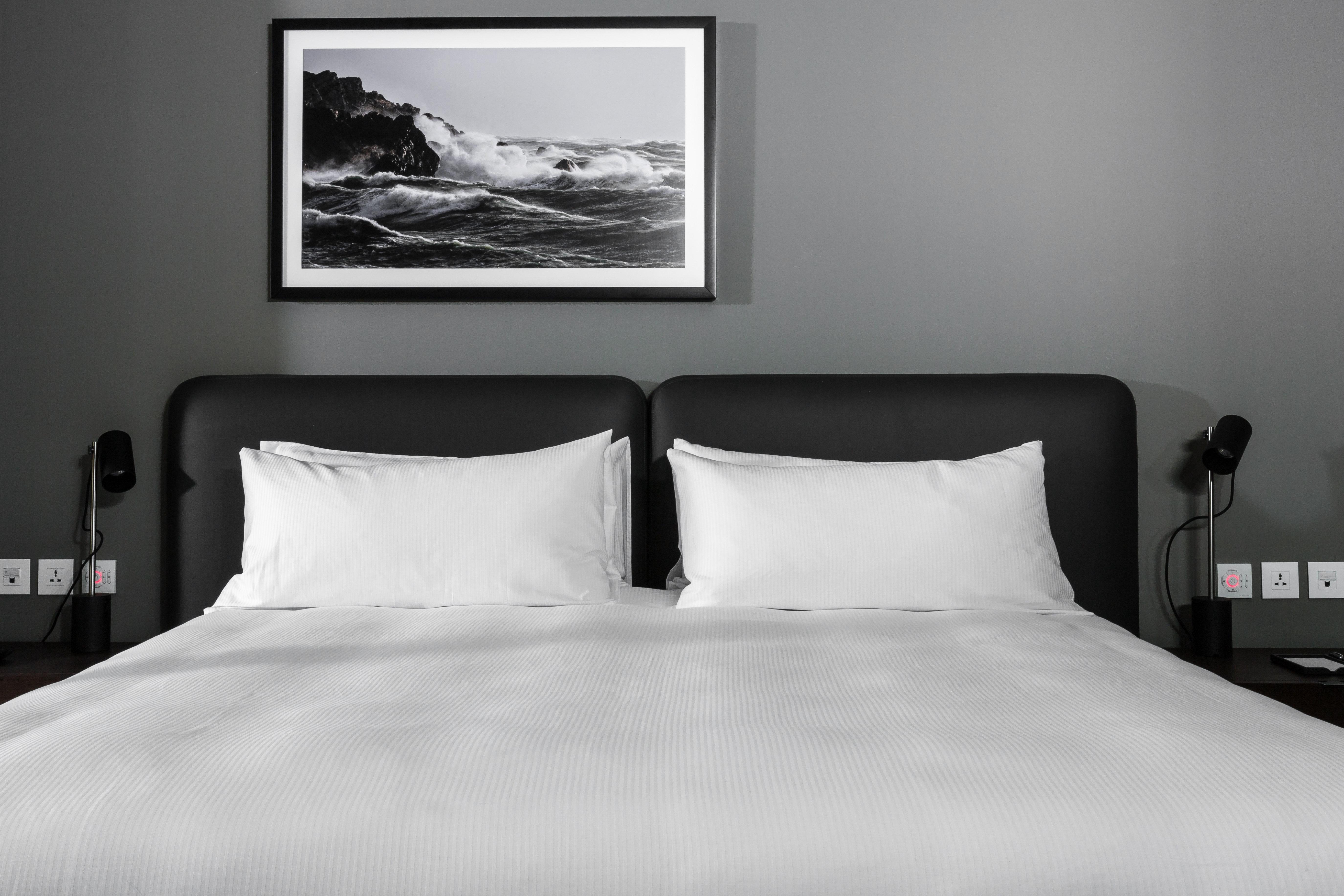 Intercontinental Malta By Ihg Hotel Saint Julian's Exterior photo A bed with two pillows