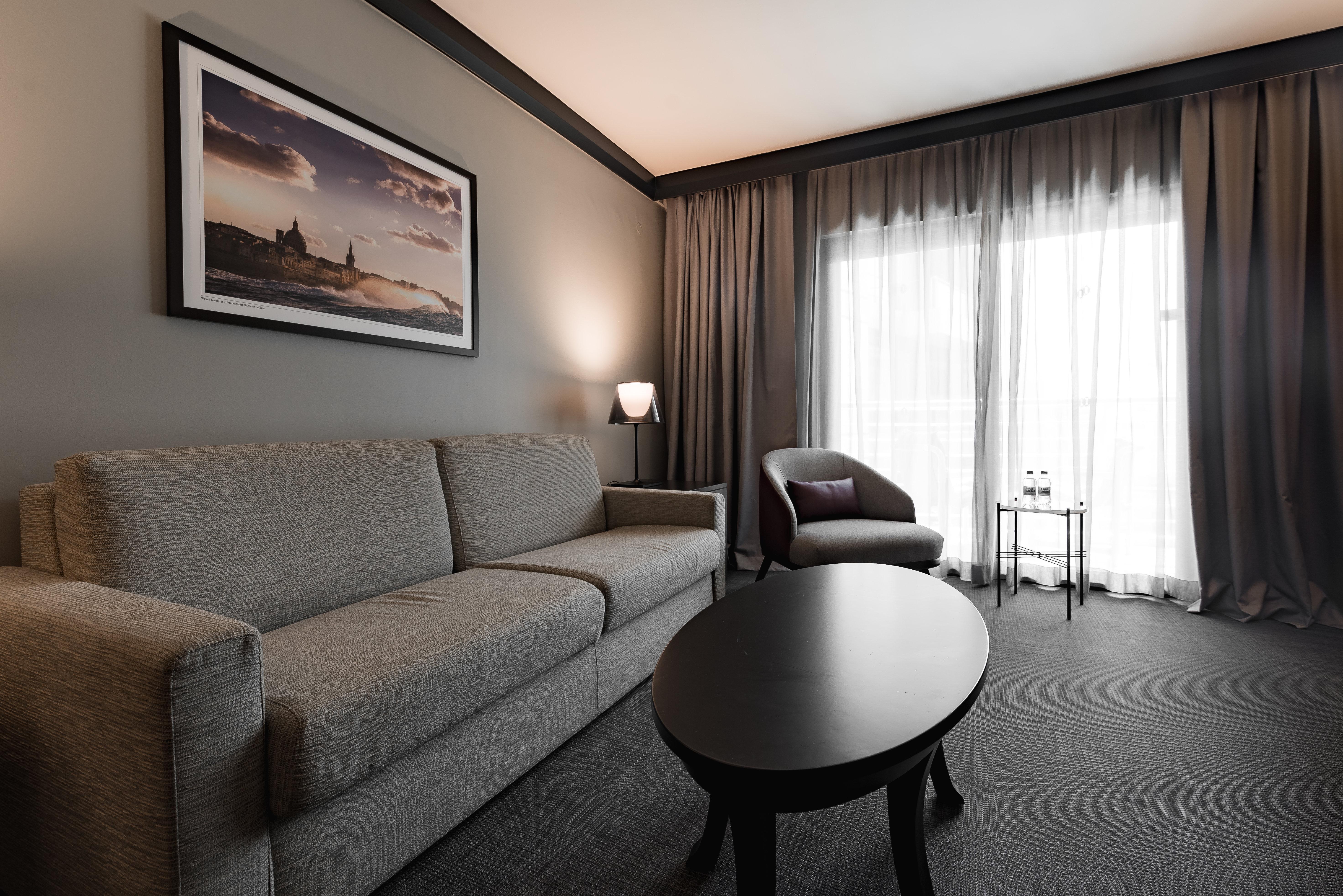 Intercontinental Malta By Ihg Hotel Saint Julian's Exterior photo A 3D rendering of a living room