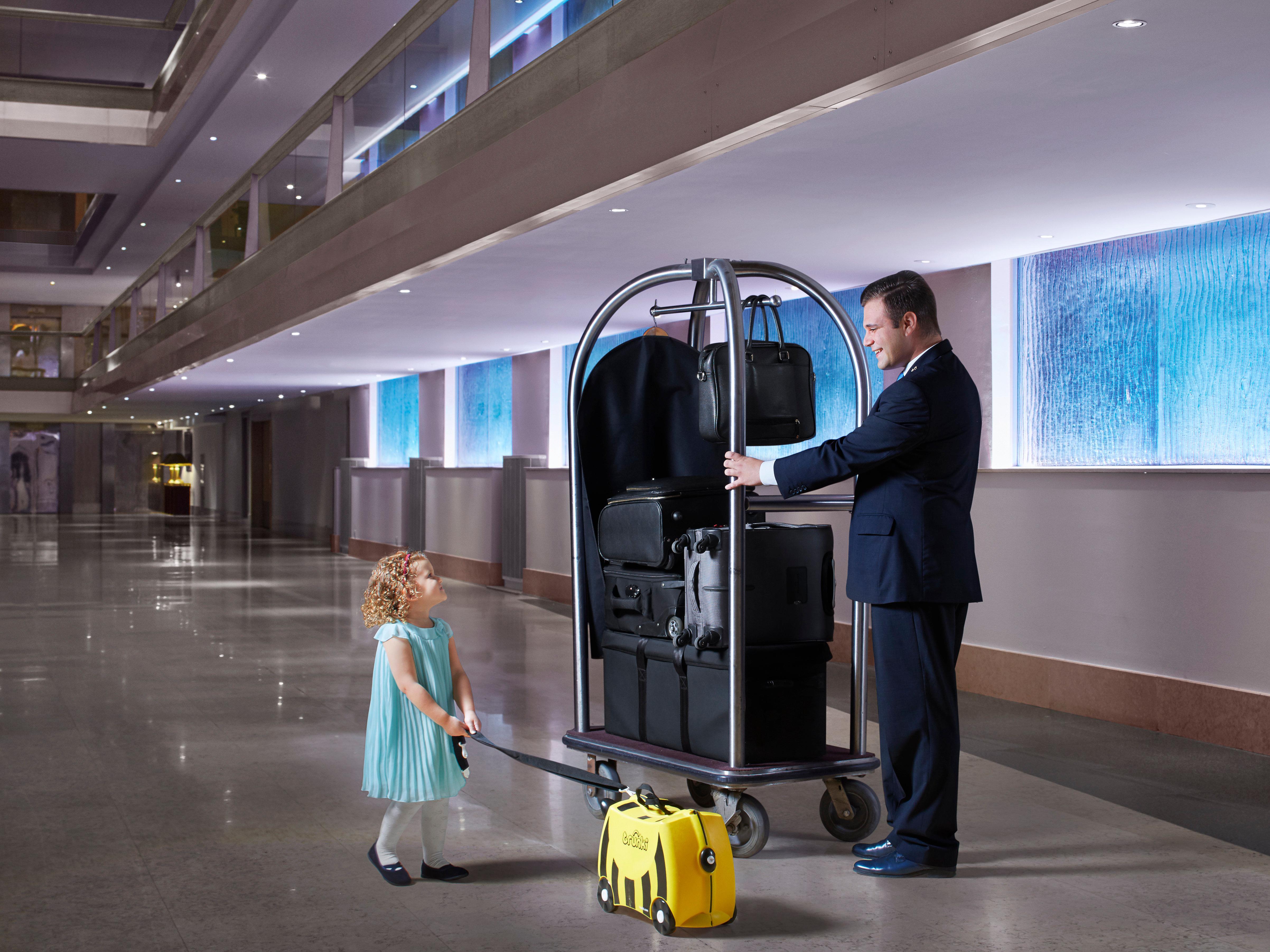 Intercontinental Malta By Ihg Hotel Saint Julian's Exterior photo A bellboy with a luggage cart