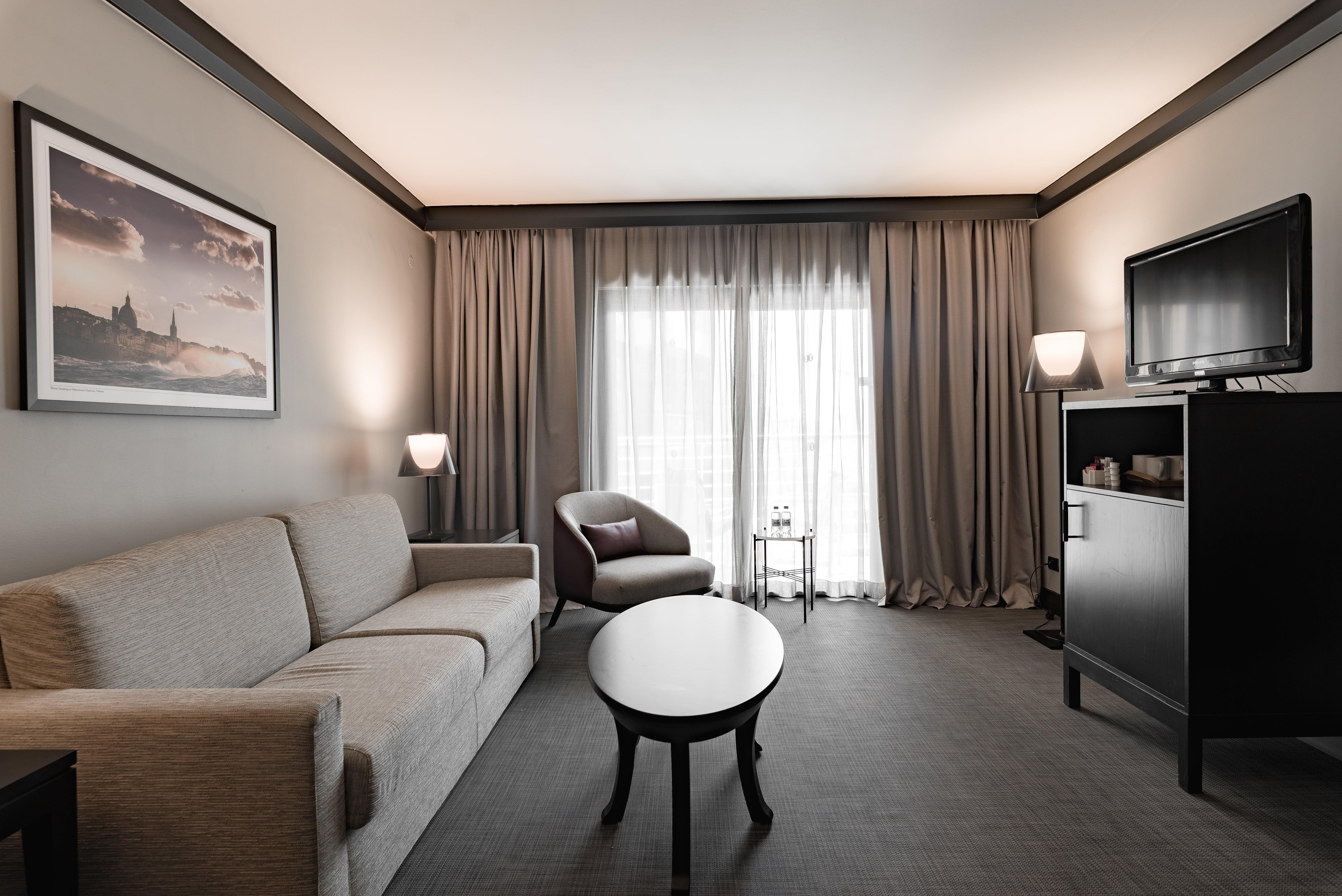 Intercontinental Malta By Ihg Hotel Saint Julian's Exterior photo A living room in a hotel