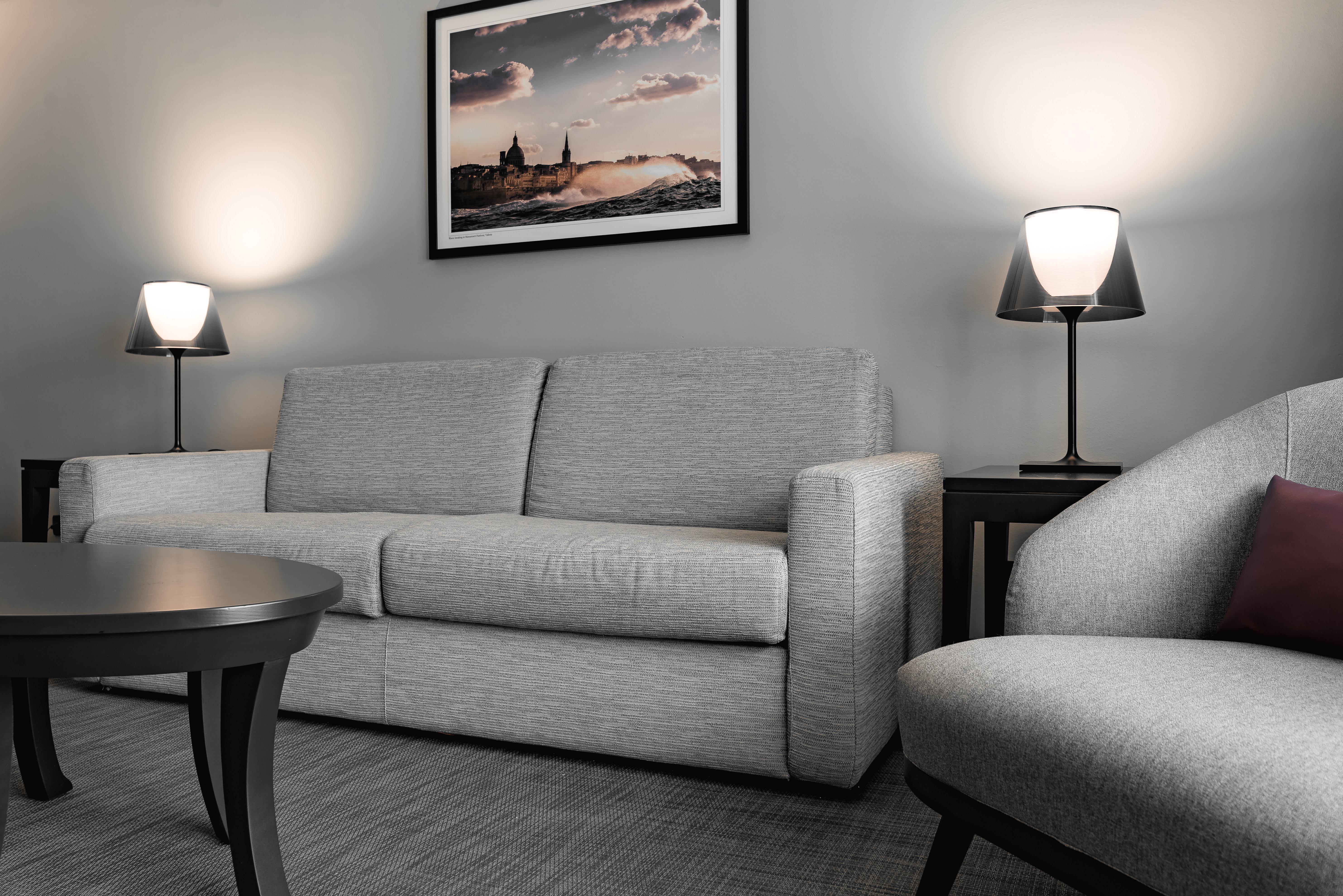 Intercontinental Malta By Ihg Hotel Saint Julian's Exterior photo A room with a sofa