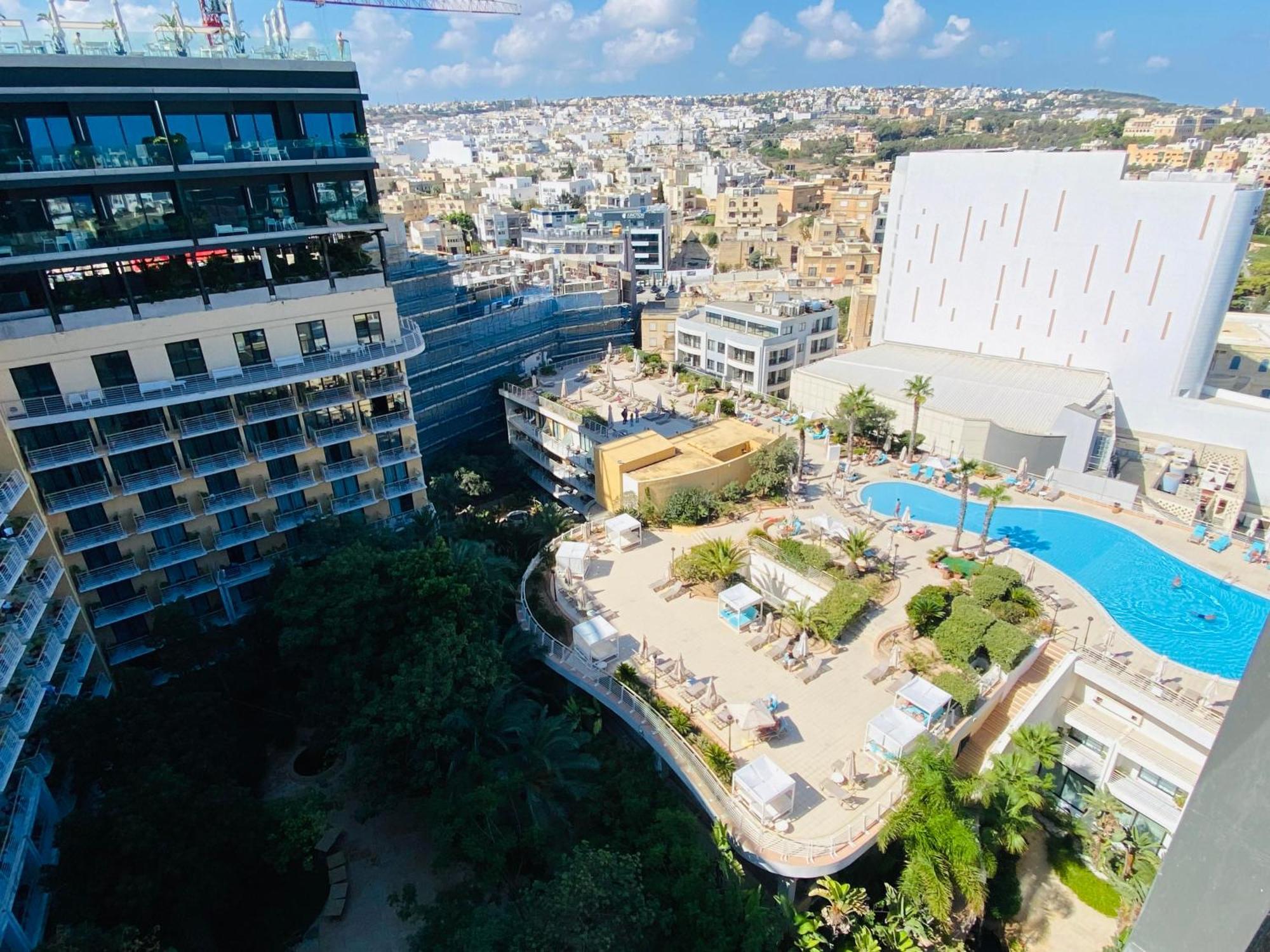 Intercontinental Malta By Ihg Hotel Saint Julian's Exterior photo The hotel's pool area